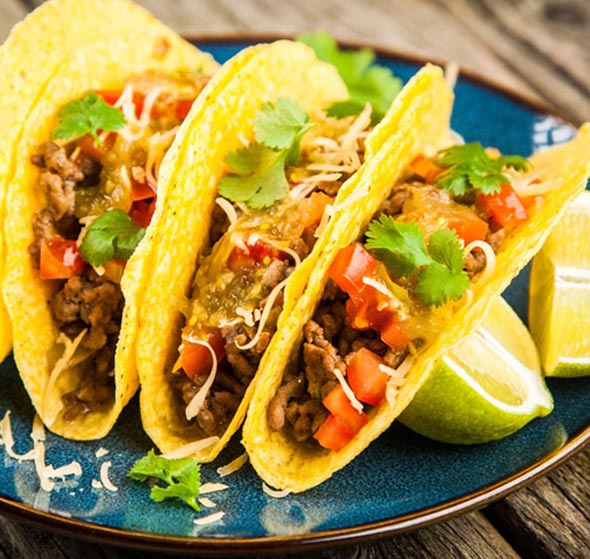 Braised beef short rib tacos on a plate