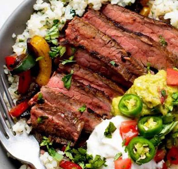 Steak fajita bowls with cilantro-lime cauliflower rice